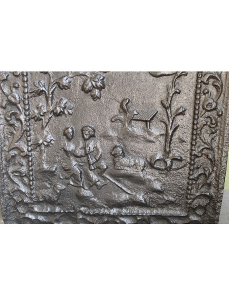 106 PIASTRA CON SCENA DI CORTEGGIAMENTO IN GHISA D'ARTE