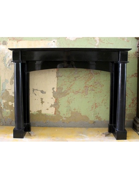 Authentic Empire period black marble fireplace mantel. This antique fire surround is original and in excellent condition.