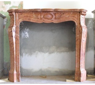 Antique Louis XV "Pompadour Galbé" marble mantel carved in Orange "Brèche orange" marble.