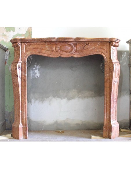 Antique Louis XV "Pompadour Galbé" marble mantel carved in Orange "Brèche orange" marble.
