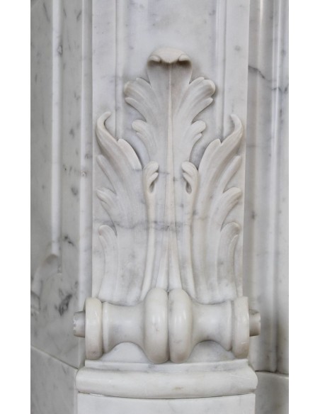 027 AG ANTIQUE LOUIS XV "ROSACES" FIREPLACE MANTEL CARVED IN WHITE CARRARA MARBLE WITH ITS OWN ORIGINAL FLORAL CAST IRON INSERT