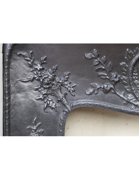 027 AG ANTIQUE LOUIS XV "ROSACES" FIREPLACE MANTEL CARVED IN WHITE CARRARA MARBLE WITH ITS OWN ORIGINAL FLORAL CAST IRON INSERT