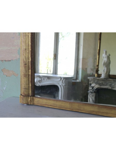 001M PROPORZIONATISSIMA CAMINIERA LUIGI XVI IN FOGLIA D'ORO CON CIMASA BAROCCA