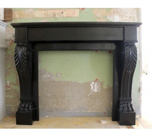Antique Empire-style fireplace mantel in Black Belgium marble. This fireplace is among the trendiest antique marble fireplaces.