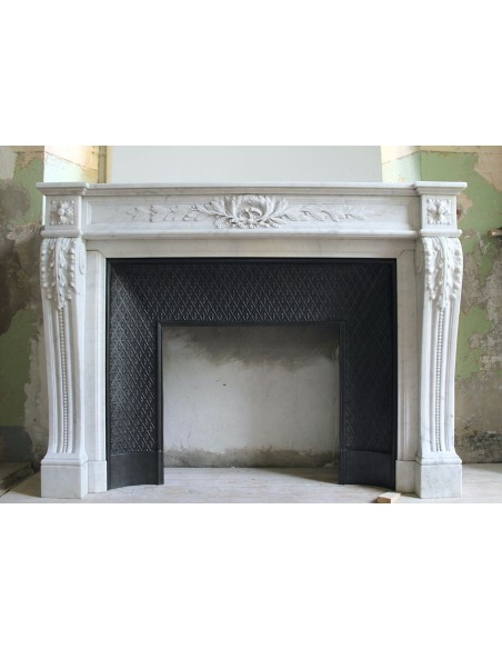 Antique Louis XVI fireplace mantel carved in white Carrara marble with its own cast iron insert