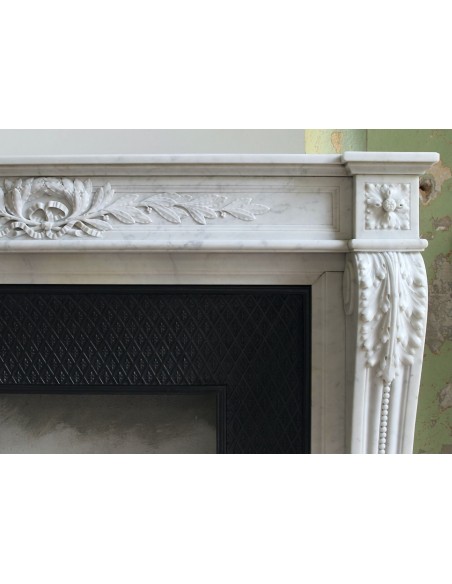 205 AG IMPORTANT LOUIS XVI "RAMO D'ULIVO" FIREPLACE MANTEL IN WHITE CARRARA MARBLE WITH ITS DECORATED CAST IRON INSERT