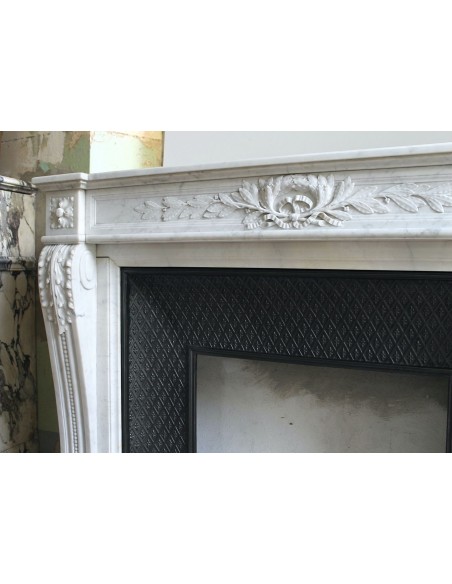205 AG IMPORTANT LOUIS XVI "RAMO D'ULIVO" FIREPLACE MANTEL IN WHITE CARRARA MARBLE WITH ITS DECORATED CAST IRON INSERT