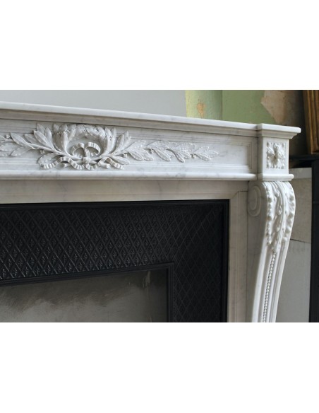 205 AG IMPORTANT LOUIS XVI "RAMO D'ULIVO" FIREPLACE MANTEL IN WHITE CARRARA MARBLE WITH ITS DECORATED CAST IRON INSERT