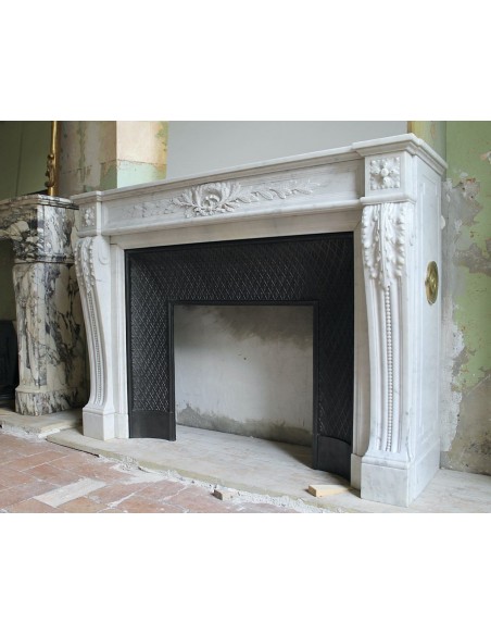 205 AG IMPORTANT LOUIS XVI "RAMO D'ULIVO" FIREPLACE MANTEL IN WHITE CARRARA MARBLE WITH ITS DECORATED CAST IRON INSERT