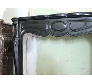 Antique Louis XV "Pied Galbé" fireplace mantel sculpted out of Black Belgian marble. 2