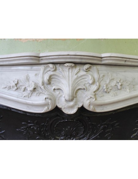 021 AG ANTIQUE LOUIS XV "DAUPHIN" MANTEL CARVED IN WHITE CARRARA MARBLE WITH ITS OWN ORIGINAL CAST IRON INSERT