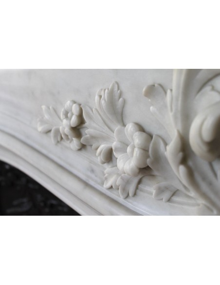 021 AG ANTIQUE LOUIS XV "DAUPHIN" MANTEL CARVED IN WHITE CARRARA MARBLE WITH ITS OWN ORIGINAL CAST IRON INSERT