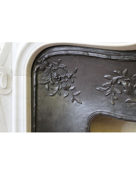 021 AG ANTIQUE LOUIS XV "DAUPHIN" MANTEL CARVED IN WHITE CARRARA MARBLE WITH ITS OWN ORIGINAL CAST IRON INSERT