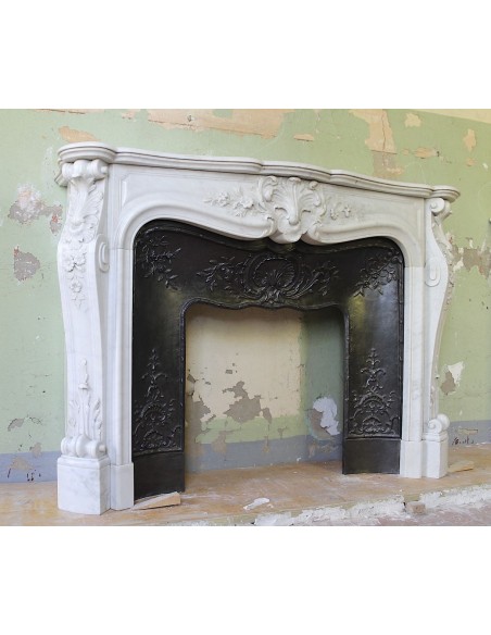 021 AG ANTIQUE LOUIS XV "DAUPHIN" MANTEL CARVED IN WHITE CARRARA MARBLE WITH ITS OWN ORIGINAL CAST IRON INSERT