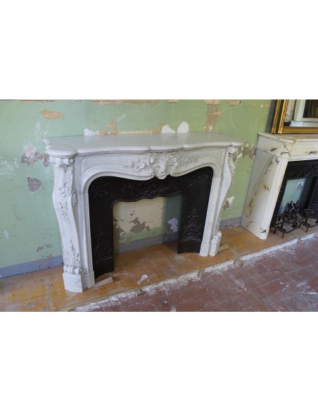 021 AG ANTIQUE LOUIS XV "DAUPHIN" MANTEL CARVED IN WHITE CARRARA MARBLE WITH ITS OWN ORIGINAL CAST IRON INSERT