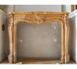 ANTIQUE ORIGINAL LOUIS XV "TROS COQUILLES AMÉLIORÉ" FIRE SURROUND CARVED IN YELLOW SIENA MARBLE