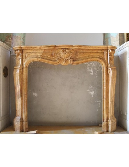 ANTIQUE ORIGINAL LOUIS XV "TROS COQUILLES AMÉLIORÉ" FIRE SURROUND CARVED IN YELLOW SIENA MARBLE