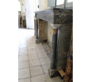 Antique Empire-style fireplace mantel in blue marble. This antique fire surround has two columns. 2