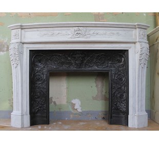 Antique beautiful Louis XVI "Ramo d'ulivo" mantel carved in white Carrara marble, with its own original cast iron insert