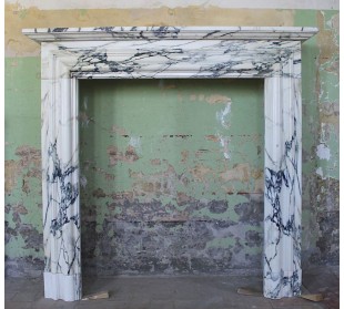 Antique “Boudin” fireplace mantel carved in Breccia Medicea marble and very large in size.