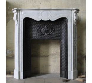 Antique white marble fireplace mantel with its own original cast iron insert.
