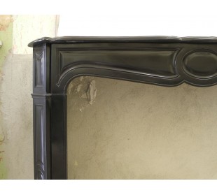 Antique marble fireplace mantle carved in black Belgium marble. This fire surround belongs to the Pompadour family. 2