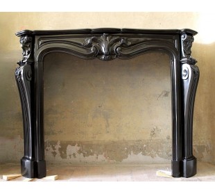 Antique Louis XV fireplace mantel carved in black Belgium marble