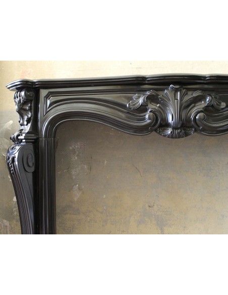 049 AG VERY RARE LOUIS XV "MOUSTACHES" FIREPLACE SURROUND IN BLACK BELGIUM MARBLE