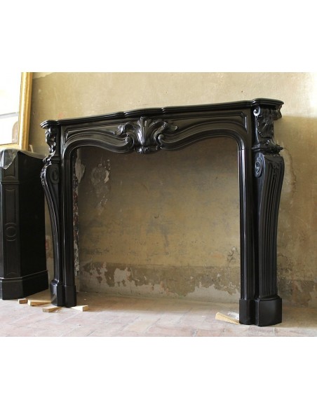 049 AG VERY RARE LOUIS XV "MOUSTACHES" FIREPLACE SURROUND IN BLACK BELGIUM MARBLE