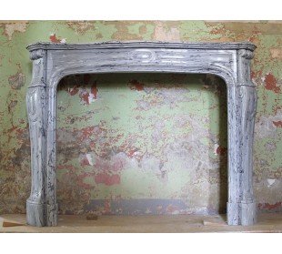 Antique Louis XV Pied Galbé mantel carved in grey and blue Fiorito marble