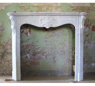 Antique Art Nouveau marble fireplace carved in white Carrara marble.