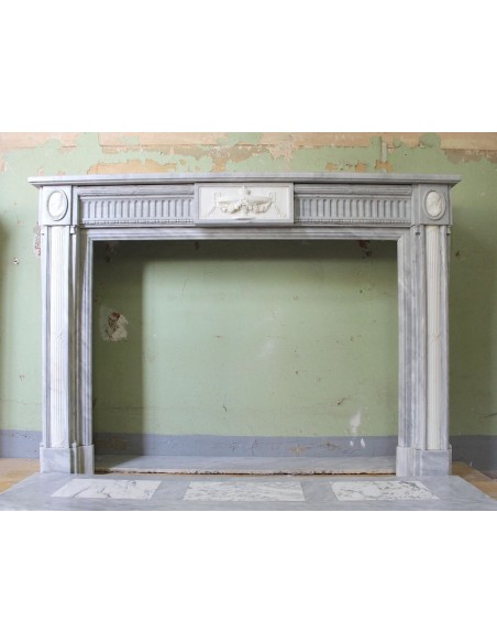 Original antique mantel carved in Grey Bardiglio marble with White Statuary inlays.