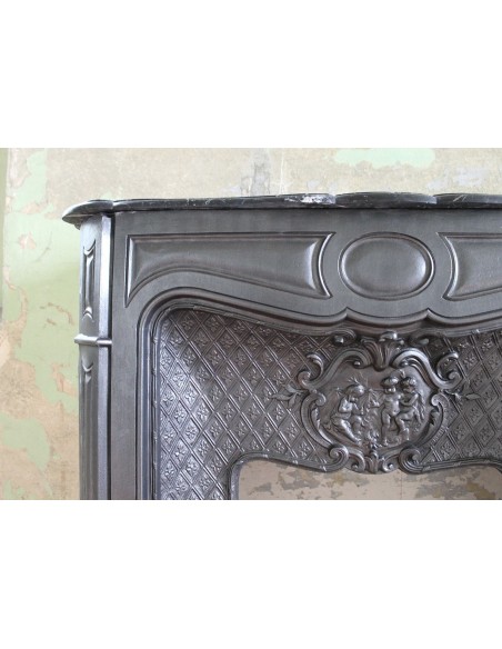 004GH ANTIQUE LARCHER "LES TROIS BÉBÉS" CAST-IRON FIREPLACE MANTEL WITH BLACK MARQUINIA MARBLE TABLET
