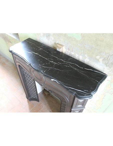 004GH ANTIQUE LARCHER "LES TROIS BÉBÉS" CAST-IRON FIREPLACE MANTEL WITH BLACK MARQUINIA MARBLE TABLET