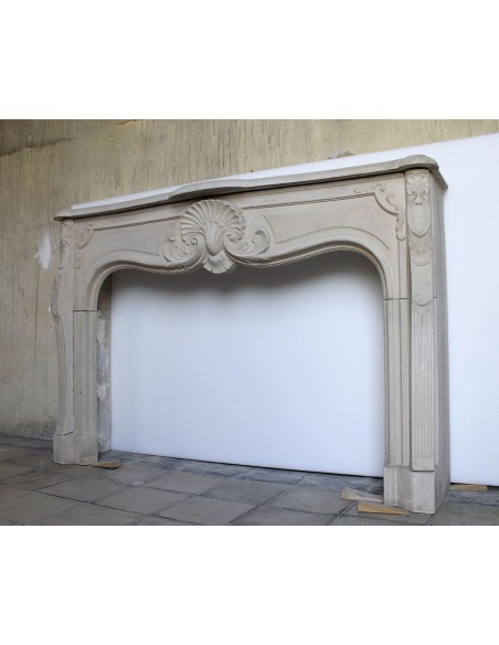 911 LARGE REGENCY FIREPLACE MANTEL CARVED IN PIERRE DORÉE DU BEAUJOLAIS STONE