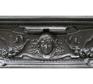 Cast iron fireplace insert that can be used as a marble mantel or as a stand-alone antique fireplace. 2