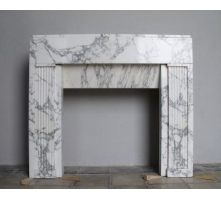 Original Art Deco fireplace mantel in white Arabescato Carrara marble.