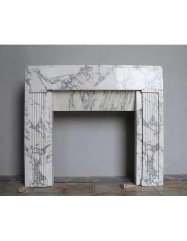 Original Art Deco fireplace mantel in white Arabescato Carrara marble.