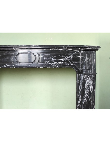 307 LOUIS XIV "PARISIENNE" FIRE SURROUND CARVED IN BLACK MARQUINIA MARBLE