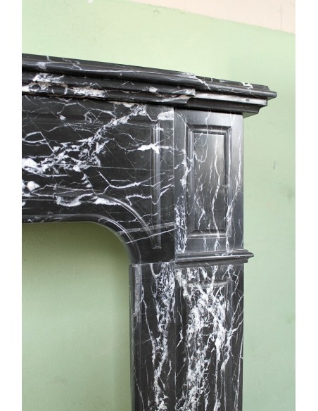 307 LOUIS XIV "PARISIENNE" FIRE SURROUND CARVED IN BLACK MARQUINIA MARBLE