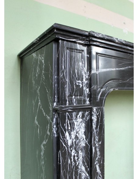307 LOUIS XIV "PARISIENNE" FIRE SURROUND CARVED IN BLACK MARQUINIA MARBLE