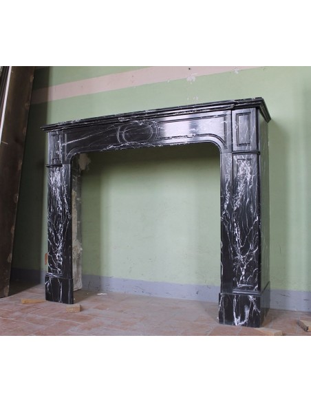 307 LOUIS XIV "PARISIENNE" FIRE SURROUND CARVED IN BLACK MARQUINIA MARBLE