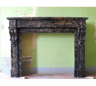 Antique Louis Philippe "Palmettes" mantel carved in rare black Portoro marble