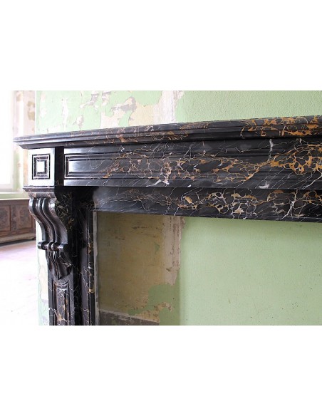 416 ANTIQUE "PALMETTES" FIREPLACE MANTEL IN RARE AND AMAZING BLACK PORTORO MARBLE