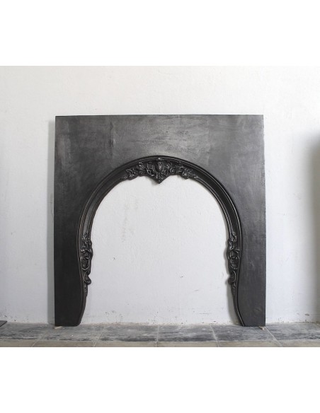 Antique "Majorelle" cast iron fireplace. This mantel is called "Oeil de boeuf" and is 100% original and certified.