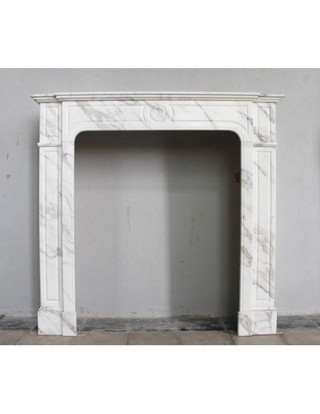 Louis XIV "Parisienne" fireplace mantel carved in white Calacatta marble, with beautiful grey veins.