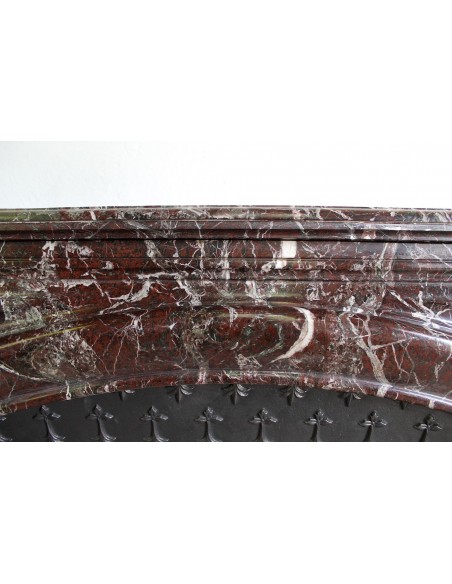 311 LOUIS XIV "BOUDIN ARRONDI" FIREPLACE MANTEL IN ROUGE LEVANTO MARBLE WITH ITS OWN ORIGINAL CAST IRON INSERT