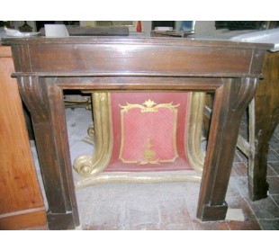 Elegant Antique wooden fireplace surround dating back to the 19th century.