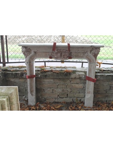 Antique Art Nouveau-style fireplace mantel, Milanese, made of cement grit, with decorative floral elements.