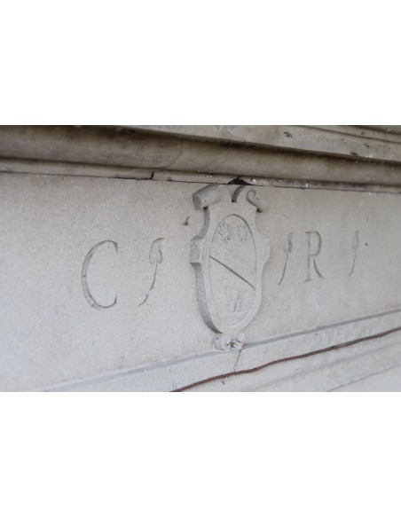 901 AG LARGE AND GENUINE ITALIAN SANDSTONE FIREPLACE WITH BLAZON